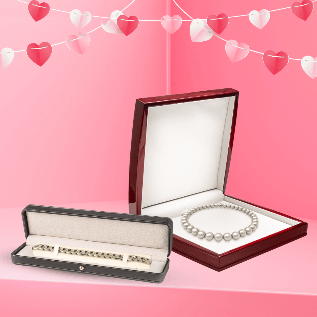 Circular image showcasing elegant necklace and bracelet boxes, featuring a rosewood pearl necklace box and a sleek bracelet box with plush interiors. Set against a pink background with heart garlands, inviting users to shop necklace and bracelet boxes for premium jewelry presentation.