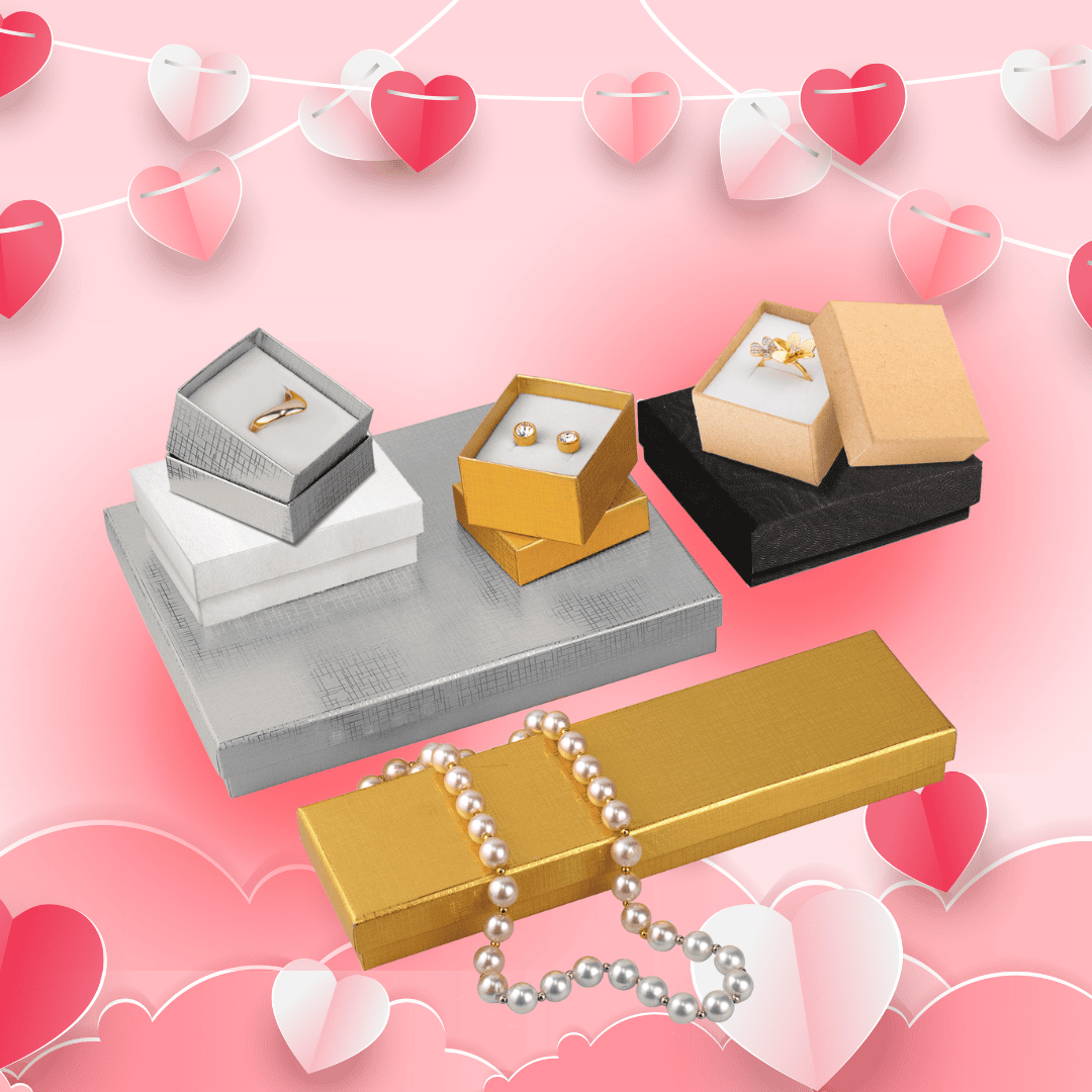 Circular image showcasing sustainable jewelry packaging, including cardboard boxes with cotton inserts in silver, gold, and kraft finishes, and an elegant gold box for necklaces. Set against a pink background with heart garlands, inviting users to shop eco-friendly packaging solutions.